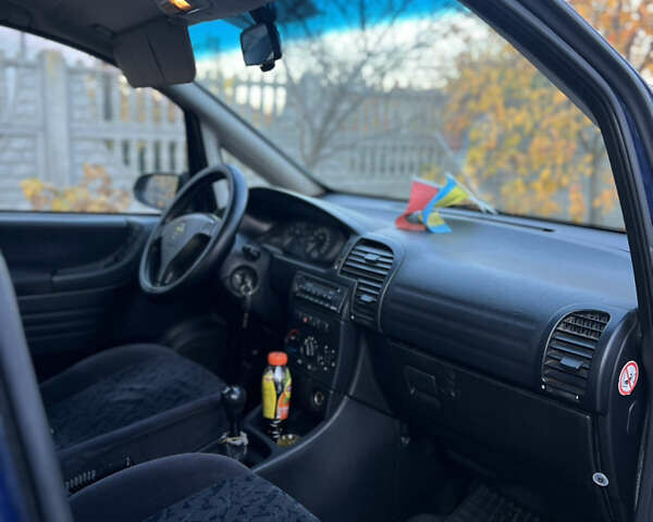 Синий Опель Зафира, объемом двигателя 1.8 л и пробегом 269 тыс. км за 2999 $, фото 26 на Automoto.ua