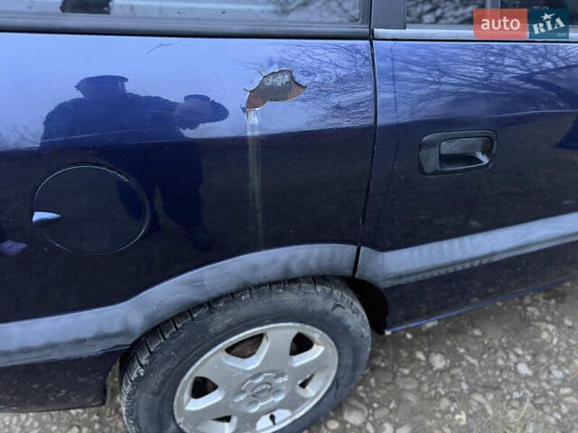 Синий Опель Зафира, объемом двигателя 1.8 л и пробегом 307 тыс. км за 2399 $, фото 19 на Automoto.ua