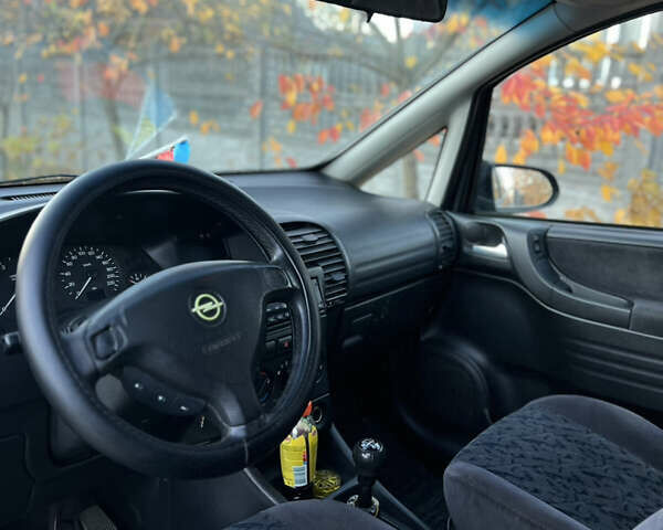 Синий Опель Зафира, объемом двигателя 1.8 л и пробегом 269 тыс. км за 2999 $, фото 36 на Automoto.ua