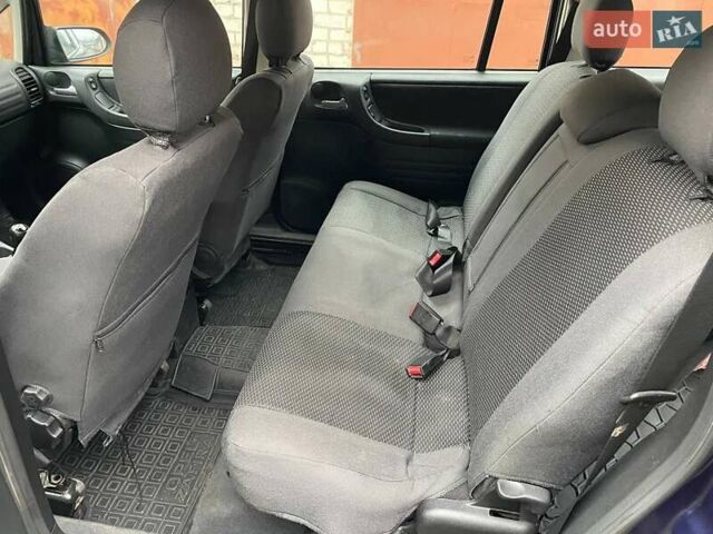 Синий Опель Зафира, объемом двигателя 1.8 л и пробегом 250 тыс. км за 3450 $, фото 21 на Automoto.ua