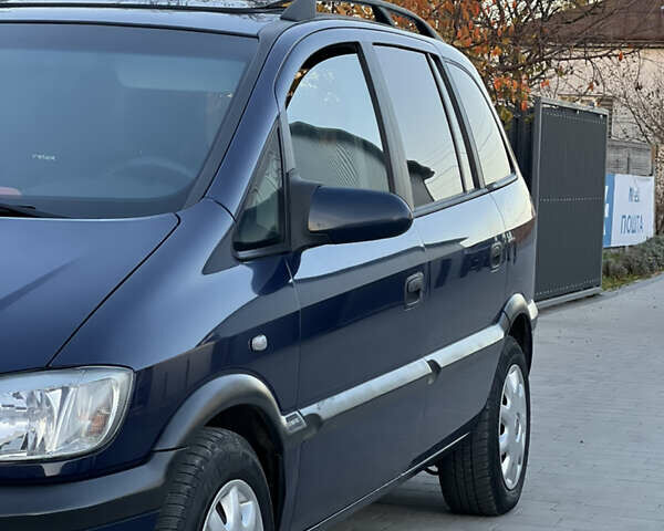 Синий Опель Зафира, объемом двигателя 1.8 л и пробегом 269 тыс. км за 2999 $, фото 1 на Automoto.ua