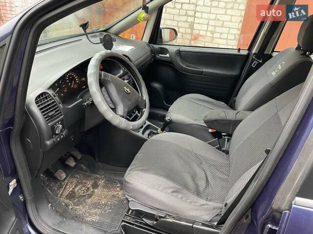 Синий Опель Зафира, объемом двигателя 1.8 л и пробегом 250 тыс. км за 3450 $, фото 19 на Automoto.ua