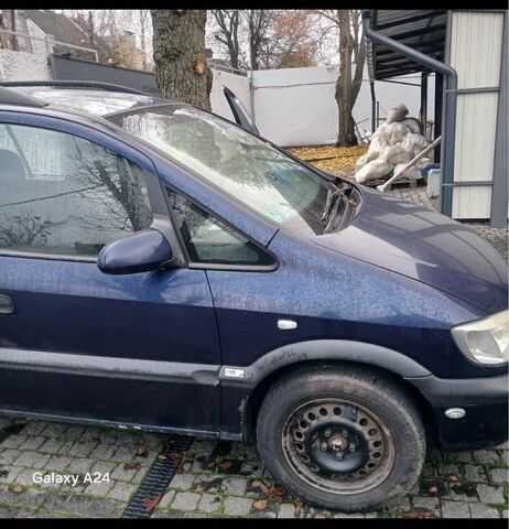 Синий Опель Зафира, объемом двигателя 1.8 л и пробегом 290 тыс. км за 2000 $, фото 4 на Automoto.ua