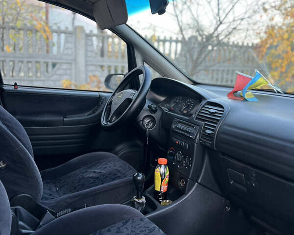 Синий Опель Зафира, объемом двигателя 1.8 л и пробегом 269 тыс. км за 2999 $, фото 28 на Automoto.ua