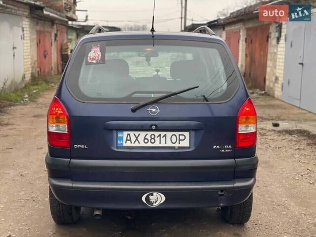 Синий Опель Зафира, объемом двигателя 1.8 л и пробегом 250 тыс. км за 3450 $, фото 1 на Automoto.ua
