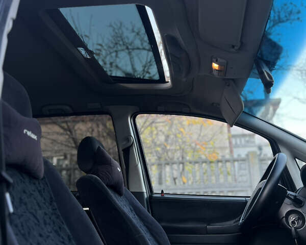 Синий Опель Зафира, объемом двигателя 1.8 л и пробегом 269 тыс. км за 2999 $, фото 29 на Automoto.ua