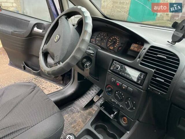 Синий Опель Зафира, объемом двигателя 1.8 л и пробегом 250 тыс. км за 3450 $, фото 30 на Automoto.ua