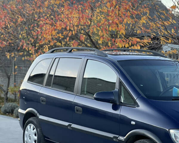 Синий Опель Зафира, объемом двигателя 1.8 л и пробегом 269 тыс. км за 2999 $, фото 18 на Automoto.ua