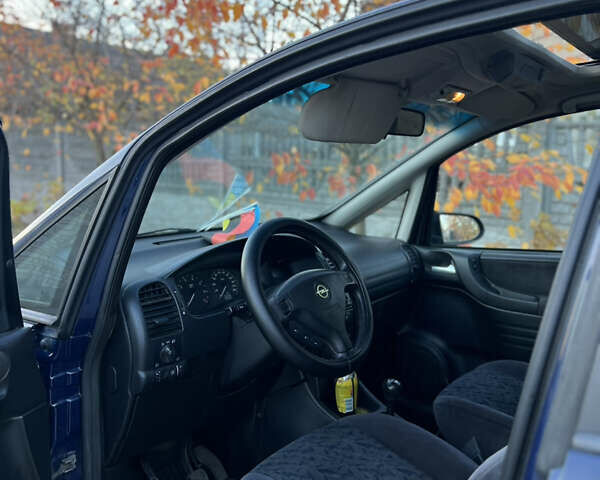 Синий Опель Зафира, объемом двигателя 1.8 л и пробегом 269 тыс. км за 2999 $, фото 32 на Automoto.ua