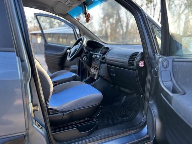 Синий Опель Зафира, объемом двигателя 2 л и пробегом 280 тыс. км за 2650 $, фото 18 на Automoto.ua