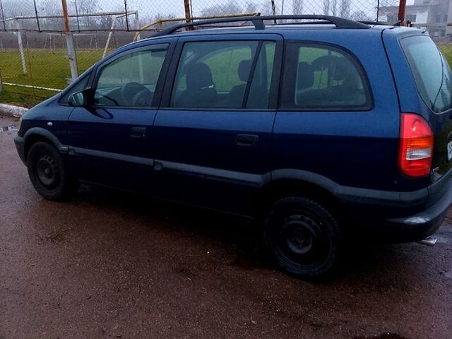 Синий Опель Зафира, объемом двигателя 1.6 л и пробегом 350 тыс. км за 2550 $, фото 4 на Automoto.ua