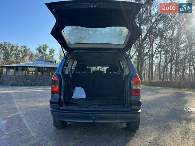 Синий Опель Зафира, объемом двигателя 2 л и пробегом 299 тыс. км за 2649 $, фото 13 на Automoto.ua