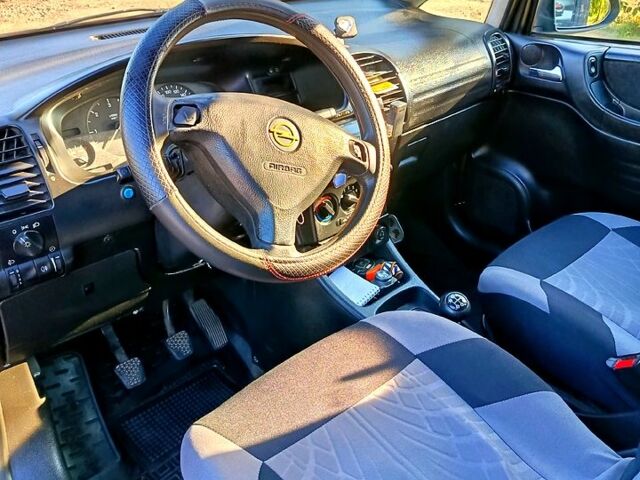 Синий Опель Зафира, объемом двигателя 2 л и пробегом 390 тыс. км за 3000 $, фото 6 на Automoto.ua