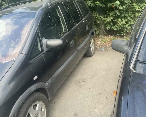 Синій Опель Зафіра, об'ємом двигуна 2 л та пробігом 415 тис. км за 1800 $, фото 3 на Automoto.ua