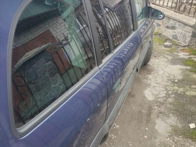 Синий Опель Зафира, объемом двигателя 2 л и пробегом 390 тыс. км за 4100 $, фото 4 на Automoto.ua