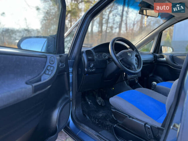 Синій Опель Зафіра, об'ємом двигуна 2 л та пробігом 299 тис. км за 2649 $, фото 19 на Automoto.ua