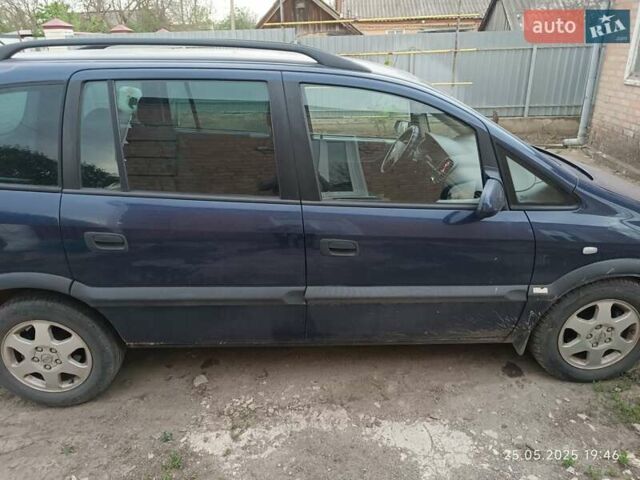 Синий Опель Зафира, объемом двигателя 2 л и пробегом 400 тыс. км за 3600 $, фото 2 на Automoto.ua