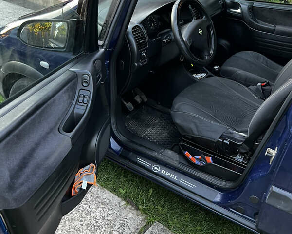 Синій Опель Зафіра, об'ємом двигуна 2 л та пробігом 400 тис. км за 3800 $, фото 7 на Automoto.ua