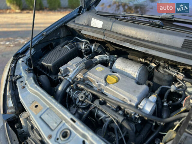 Синій Опель Зафіра, об'ємом двигуна 2 л та пробігом 299 тис. км за 2649 $, фото 14 на Automoto.ua