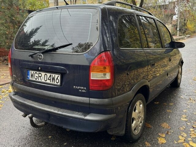 Синій Опель Зафіра, об'ємом двигуна 2 л та пробігом 300 тис. км за 1900 $, фото 5 на Automoto.ua