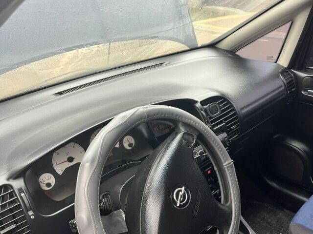 Синий Опель Зафира, объемом двигателя 0 л и пробегом 312 тыс. км за 1550 $, фото 5 на Automoto.ua