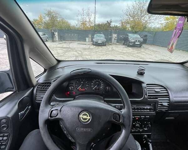 Синий Опель Зафира, объемом двигателя 1.8 л и пробегом 407 тыс. км за 2800 $, фото 7 на Automoto.ua