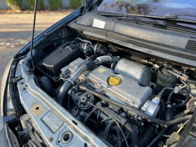 Синий Опель Зафира, объемом двигателя 2 л и пробегом 280 тыс. км за 2650 $, фото 13 на Automoto.ua