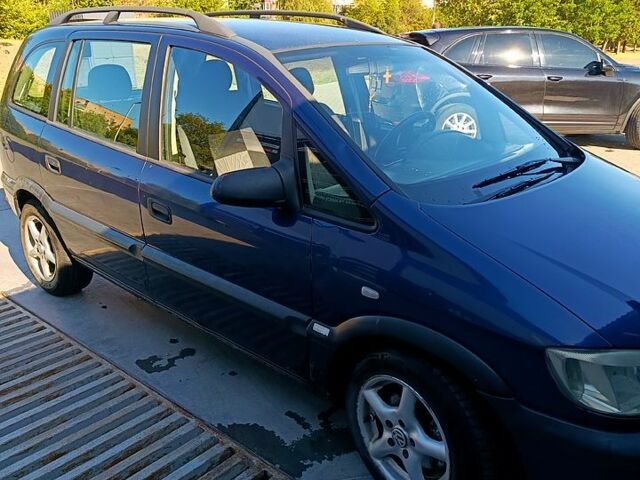 Синий Опель Зафира, объемом двигателя 2 л и пробегом 390 тыс. км за 3000 $, фото 1 на Automoto.ua