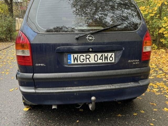 Синій Опель Зафіра, об'ємом двигуна 2 л та пробігом 300 тис. км за 1900 $, фото 4 на Automoto.ua