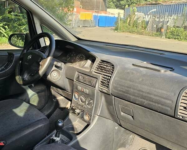 Синий Опель Зафира, объемом двигателя 2 л и пробегом 200 тыс. км за 1250 $, фото 14 на Automoto.ua