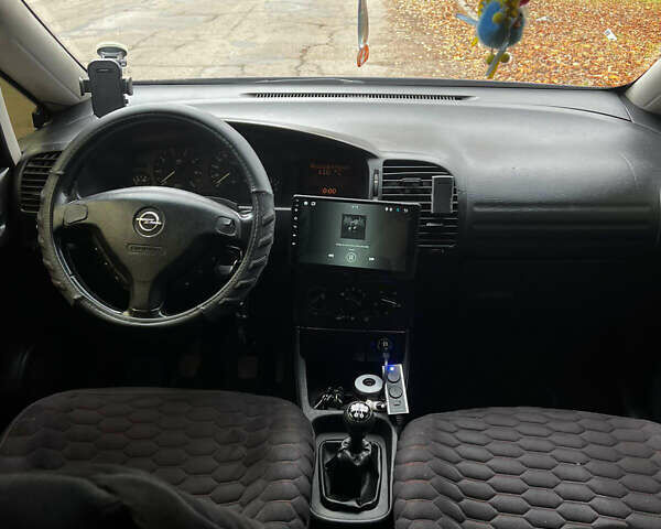 Синий Опель Зафира, объемом двигателя 1.8 л и пробегом 240 тыс. км за 3700 $, фото 6 на Automoto.ua