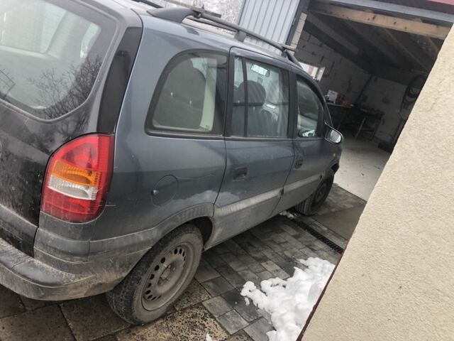 Синий Опель Зафира, объемом двигателя 1.8 л и пробегом 412 тыс. км за 1488 $, фото 1 на Automoto.ua