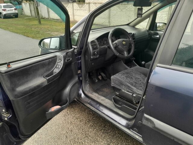 Синій Опель Зафіра, об'ємом двигуна 2 л та пробігом 320 тис. км за 3350 $, фото 7 на Automoto.ua