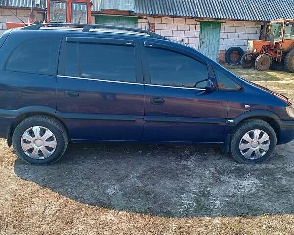 Синий Опель Зафира, объемом двигателя 2 л и пробегом 400 тыс. км за 3500 $, фото 3 на Automoto.ua