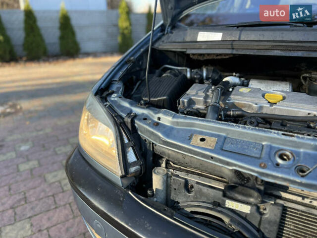 Синій Опель Зафіра, об'ємом двигуна 2 л та пробігом 299 тис. км за 2649 $, фото 13 на Automoto.ua