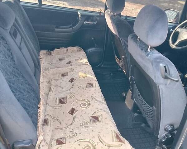 Синий Опель Зафира, объемом двигателя 2 л и пробегом 400 тыс. км за 3500 $, фото 5 на Automoto.ua