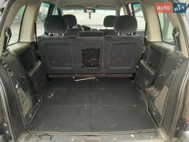 Синий Опель Зафира, объемом двигателя 1.99 л и пробегом 321 тыс. км за 3450 $, фото 4 на Automoto.ua