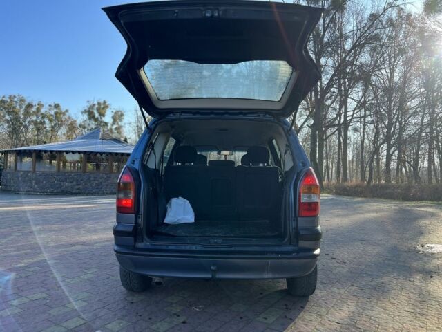 Синий Опель Зафира, объемом двигателя 2 л и пробегом 280 тыс. км за 2650 $, фото 10 на Automoto.ua