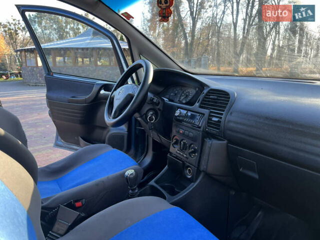 Синій Опель Зафіра, об'ємом двигуна 2 л та пробігом 299 тис. км за 2649 $, фото 18 на Automoto.ua