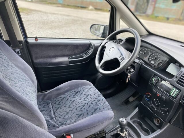 Синій Опель Зафіра, об'ємом двигуна 2 л та пробігом 200 тис. км за 2300 $, фото 6 на Automoto.ua