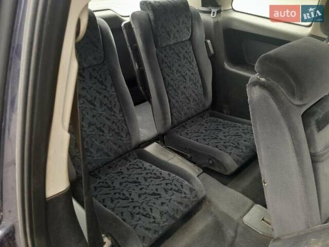 Синий Опель Зафира, объемом двигателя 1.99 л и пробегом 321 тыс. км за 3450 $, фото 7 на Automoto.ua