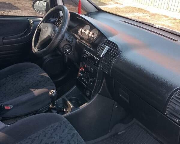 Синий Опель Зафира, объемом двигателя 2 л и пробегом 400 тыс. км за 3500 $, фото 4 на Automoto.ua