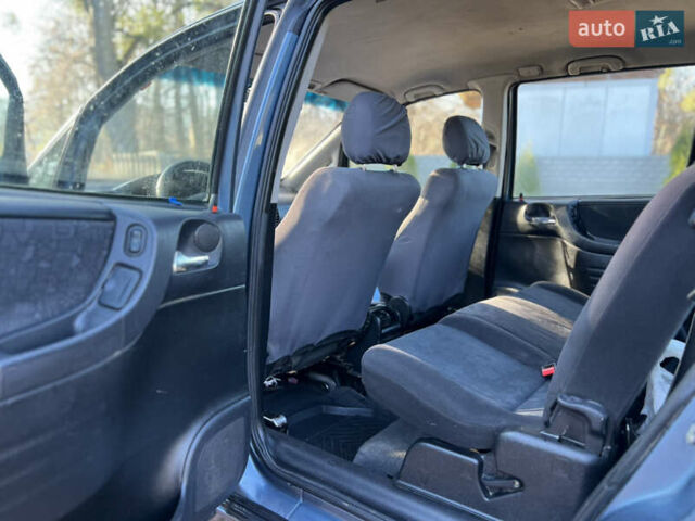 Синій Опель Зафіра, об'ємом двигуна 2 л та пробігом 299 тис. км за 2649 $, фото 21 на Automoto.ua