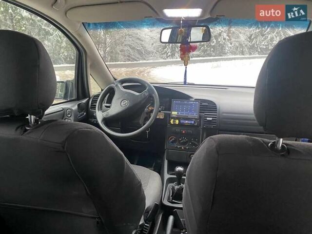 Синий Опель Зафира, объемом двигателя 2 л и пробегом 256 тыс. км за 3500 $, фото 2 на Automoto.ua