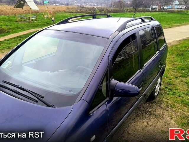 Синий Опель Зафира, объемом двигателя 2 л и пробегом 333 тыс. км за 1200 $, фото 6 на Automoto.ua