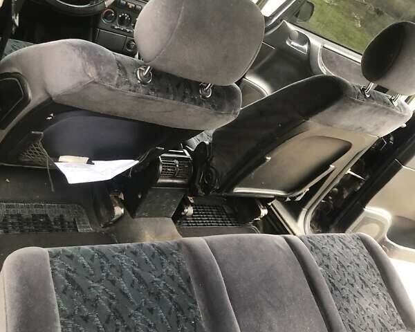 Синий Опель Зафира, объемом двигателя 2 л и пробегом 350 тыс. км за 3600 $, фото 5 на Automoto.ua