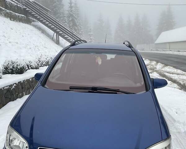 Синий Опель Зафира, объемом двигателя 2 л и пробегом 256 тыс. км за 3500 $, фото 1 на Automoto.ua