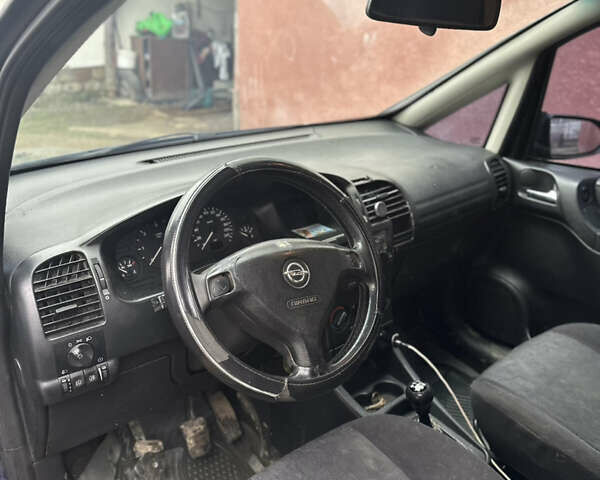 Синий Опель Зафира, объемом двигателя 2 л и пробегом 385 тыс. км за 3200 $, фото 4 на Automoto.ua