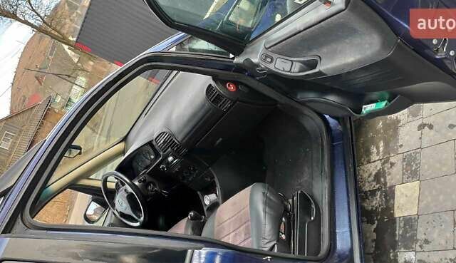 Синий Опель Зафира, объемом двигателя 2 л и пробегом 260 тыс. км за 3200 $, фото 2 на Automoto.ua