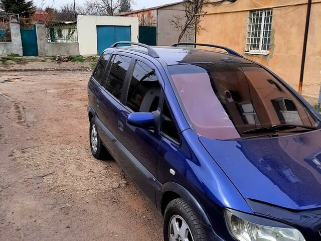 Синий Опель Зафира, объемом двигателя 2 л и пробегом 300 тыс. км за 2350 $, фото 3 на Automoto.ua